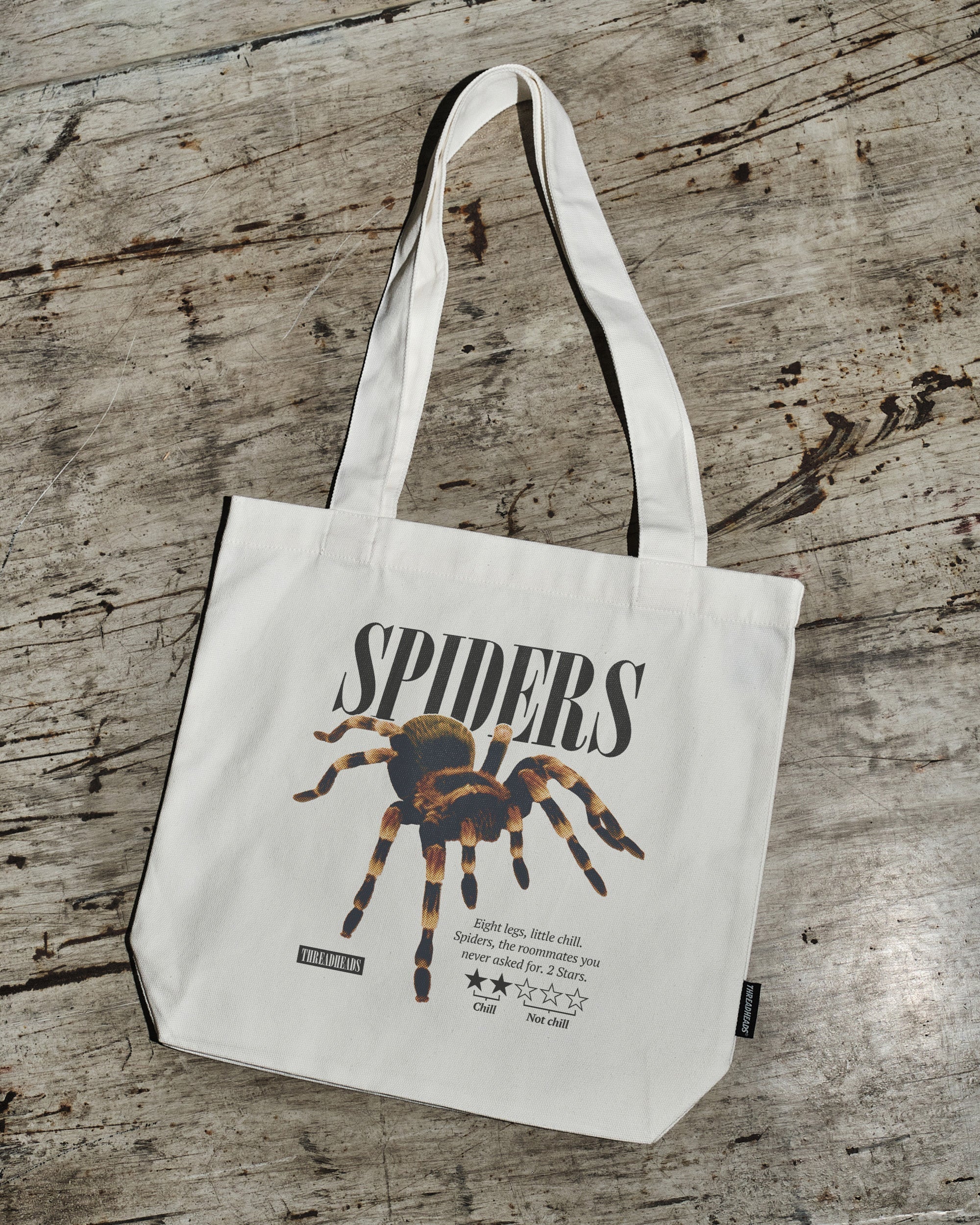 Spiders: A Review Tote Bag